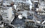 FILE -- Aerial views of the Nippon Dynawave Packaging Co. in Longview, Wash., showing the scene of a major chemical tank implosion at a Southwest Washington paper mill, May 26, 2026.
