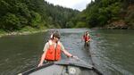 Biologists tighten a 200 foot long delicate seine net to encircle spawning chinook. They are trapping the salmon and moving them upriver to ensure their eggs aren't suffocated by sediment released when the Condit Dam is breached in October.