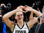 Iowa guard Caitlin Clark celebrates as she walks off the court after an NCAA college basketball game against Nebraska on Jan. 27.