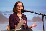 Oregon Gov. Kate Brown responds to a question at a gubernatorial debate at Winston Churchill High School in Eugene on Oct. 6, 2016.