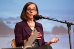 Oregon Gov. Kate Brown responds to a question at a gubernatorial debate at Winston Churchill High School in Eugene on Oct. 6, 2016.