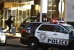 A guest is seen at the valet area outside Trump International Hotel in Las Vegas on Thursday.