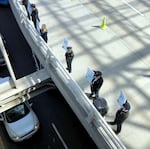 Alaska Airlines pilots picket at Portland International Airport Friday, April 1, 2022, protesting an impasse in a nearly three-year contract negotiation. Flights were canceled on the West Coast, including 20 in Portland.