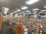 This undated photo shows the massive selection of DVDs and VHS tapes available for rent inside Video Horizons in Astoria. The business opened nearly 40 years ago and is the only video rental store remaining in the city.