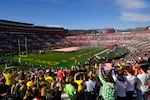 Fans stand for the national anthem before the Rose Bowl NCAA college football game in 2020.