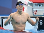 China's Wang Shun celebrates after winning gold in the final of the men's 200m individual medley swimming event during the Tokyo Olympic Games on July 30, 2021. His name is on a list of athletes who allegedly tested positive for a performance enhancing drug.