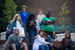 PSU student Donald Thompson III bows his head during a moment of silence for Jason Washington.