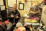 Bill Griesar, assistant professor of neurology at Portland State University, creates brain cell neurons from colorful pipe cleaners. “The time change is bad for us,” he said.