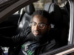 Matthew McGlory, a rideshare driver and active member of MULDA, in downtown Minneapolis on May 26. McGlory says drivers in other states have been watching Minnesota, waiting to see what happened.