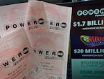 Powerball tickets are shown at a lottery agent, Tuesday, Oct. 10, 2023, in Haverhill, Mass.