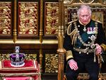 Britain's Prince Charles sits by the Imperial State Crown in the House of Lords on Tuesday during the opening of Parliament in London.
