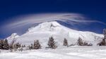 FILE - In this Dec. 13, 2009, file photo, a cloud forms over Mount Hood as seen from Government Camp, Ore.