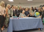 Oregon Gov. Tina Kotek signs four education bills that passed the 2025 legislative session at a ceremony Thursday, July 31, 2025 at Prairie Mountain K-8 School in Eugene.