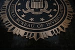 The J. Edgar Hoover building's FBI seal pictured in March in Washington, D.C. Dan Bongino, deputy director of the FBI, announced the bureau’s renewed efforts around three cases on Monday.