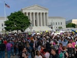 Abortion rights activists protest outside of the U.S. Supreme Court in Washington on May 3, a day after the leak of a draft opinion suggesting a possible reversal of Roe v. Wade. 