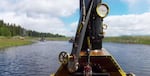 Steamboats move up a historic canal on Klamath Lake.