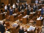 Senators applaud as the Sine Die resolution is passed on Friday, July 7, 2017, at the Oregon State Capitol.