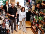 Vice President Harris speaks with store owner Nick Meyer during her campaign stop with Minnesota Governor Tim Walz and Bon Iver singer Justin Vernon in Eau Claire, Wisconsin on August 7, 2024.