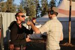 Aaron Scott talks with a South African filmmaker who is working on a documentary set at the Oregon Eclipse Festival.