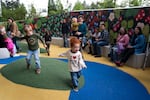 Kids play in a space of the library dedicated to youth programs at the East County Library on May 16, 2026, in Gresham, Ore.