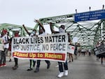 Protestors head north on the Interstate 5 bridge on June 19, 2020. Southwest Washington has a very recent history with police violence, which civil rights organizations continue to question.
