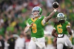 Oregon quarterback Dillon Gabriel (8) passes against Ohio State during the second half in the quarterfinals of the Rose Bowl College Football Playoff, Wednesday, Jan. 1, 2025, in Pasadena, Calif.