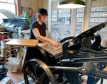 Emily Riley, owner of RX Letterpress, works at her studio inside Cargo Inc. in Southeast Portland on March 20, 2025. Riley moved into Cargo a couple years before the pandemic and helped recruit other local vendors to the spot as COVID-19 presented new challenges for independent retailers.