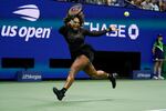 Serena Williams returns a shot to Ajla Tomljanovic during the third round of the U.S. Open tennis championships on Friday.