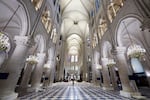 The nave of Notre-Dame de Paris cathedral is seen while French President Emmanuel Macron visits the restored interiors of the cathedral, Friday Nov. 29, 2024, in Paris.