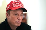 White House adviser Elon Musk wears a red baseball cap at a Cabinet meeting at the White House.