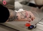 A woman reached for a dose of methadone at the Behavioral Health Network opioid treatment clinic.