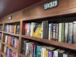 The inside of Lost & Bound Books, a mobile bookstore owned by Desirai Vuylsteke and Sidnee Andreychenko, on June 4, 2026, the day of the "Think Out Loud" interview about Portland Book Week. The mobile bookstore is one of more than 80 independent bookshops participating in the third annual event.