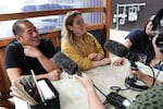 Win Win co-founders Jasper Shen (L), Catie Hannigan (center) and Linh Tran (R) speaks with "All Things Considered" producer Crystal Ligori outside XLB restaurant in Portland, Ore. on June 9, 2022.