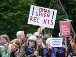 Demonstrators hold up a placard reading "Grannies against the right" as they protest against the electoral campaign meeting of the far-right AfD party ahead of the European Parliament election in Marl, western Germany, May 25.