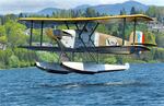 The replica Douglas World Cruiser landing on Lake Washington in 2019.
