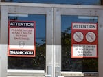 FILE: Signs at Richmond Elementary in southeast Portland require masks to enter the school. Portland Public Schools started the school year online because of COVID-19.