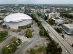 FILE - The Moda Center, left, in Portland, Ore., on Sept. 4, 2025. Portland city leaders are negotiating with the Portland Trail Blazers over possible renovations to the arena, as leaders consider awarding development rights to the nonprofit Albina Vision Trust. 