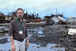 Jay Wilson, Oregon Seismic Commission Chair, surveys tsunami damage on a 2011 visit to Japan.