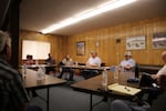 A dozen county commissioners gathered June 11, 2020, in Prairie City after being invited to talk about "battle plans" in response to Gov. Kate Brown's plans for reopening Oregon.
