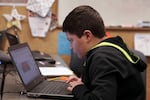 Ethan Turpin explores 3-D design at the Multnomah County Library's Rockwood branch. 