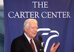 FILE - Former President Jimmy Carter gestures while addressing a Carter Center event marking the 25th anniversary of the Camp David peace accord, the first peace treaty between Israel and Egypt, Wednesday, Sept. 17, 2003  in Washington.