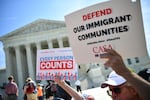 In this 2019 file photo, demonstrators rally at the U.S. Supreme Court in Washington, DC, to protest a proposal to add a citizenship question in the 2020 Census. President Trump has long favored adding the question and his recent order for a "new" census bring the issue back to the forefront.