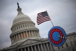 A QAnon sign at the U.S. Capitol on Jan. 6, 2021. Many of the rioters who attacked the Capitol later told investigators they were motivated in part by the online conspiracy theory.