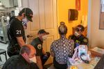 Salem Fire Department paramedics treat a restaurant worker who collapsed from heat exposure, in the back room of a restaurant during a heat wave, Saturday, June 26, 2021, in Salem, Ore.