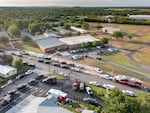 Law enforcement officers work on Wednesday at Robb Elementary School, the site of Tuesday's mass shooting in Uvalde, Texas.