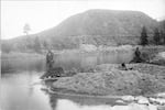 Chinese gold miner working on an Idaho River. The gold rush brought tens of thousands of Chinese people to America's West Coast.