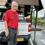 John Gillespie said athletes that he coached at Central Catholic High School decades ago gifted him with a personalized license plate, which he's moved from car to car several times.