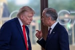 FILE - President Donald Trump speaks with Canadian Prime Minister Mark Carney, right, at a working lunch with leaders of G7 and the Middle East in Evian-les-Bains, France, Tuesday, June 16, 2026.