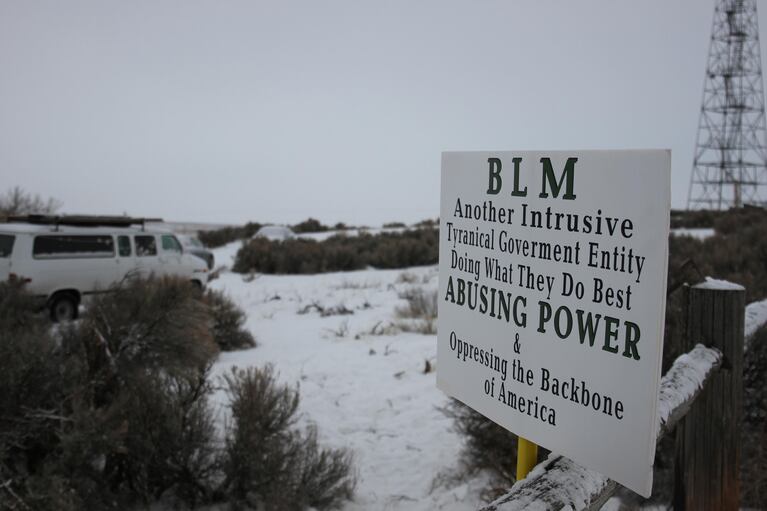 Protesters blocked the entrance to the refuge Sunday, hanging anti-government signs on the fenceposts.