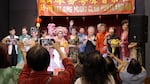 Yat Sing members pose for a group photo on stage following their performance at the Chinese Consolidated Benevolent Association in Portland, Ore., on Aug. 24, 2024.